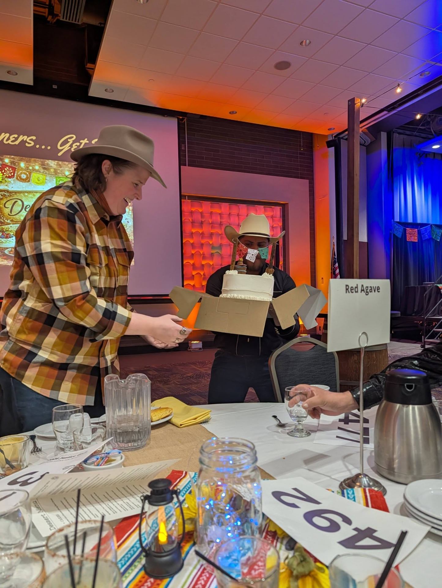 A celebration moment at a nonprofit fundraising dinner